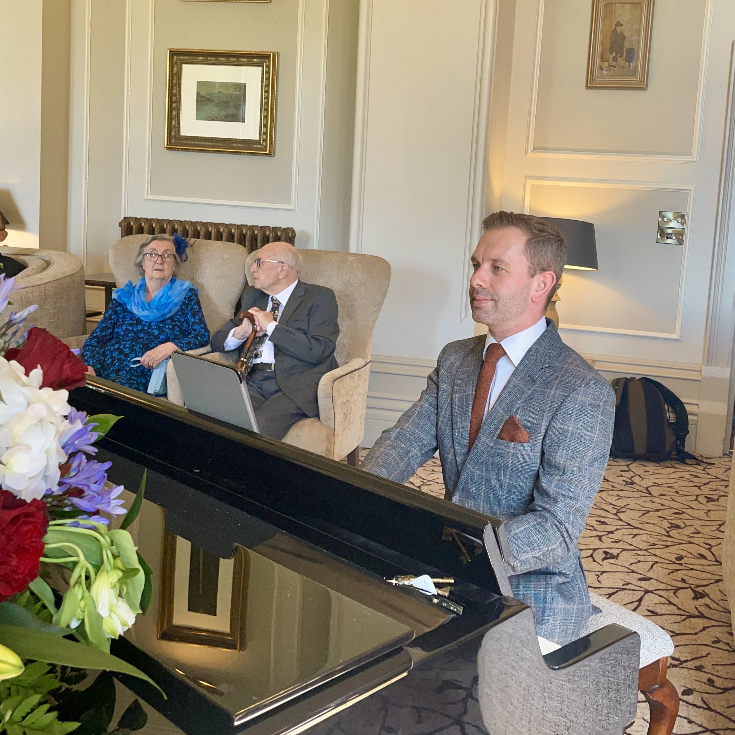 Armathwaite Hall wedding pianist Craig Smith plays piano for the wedding ceremony in the Lake View Lounge