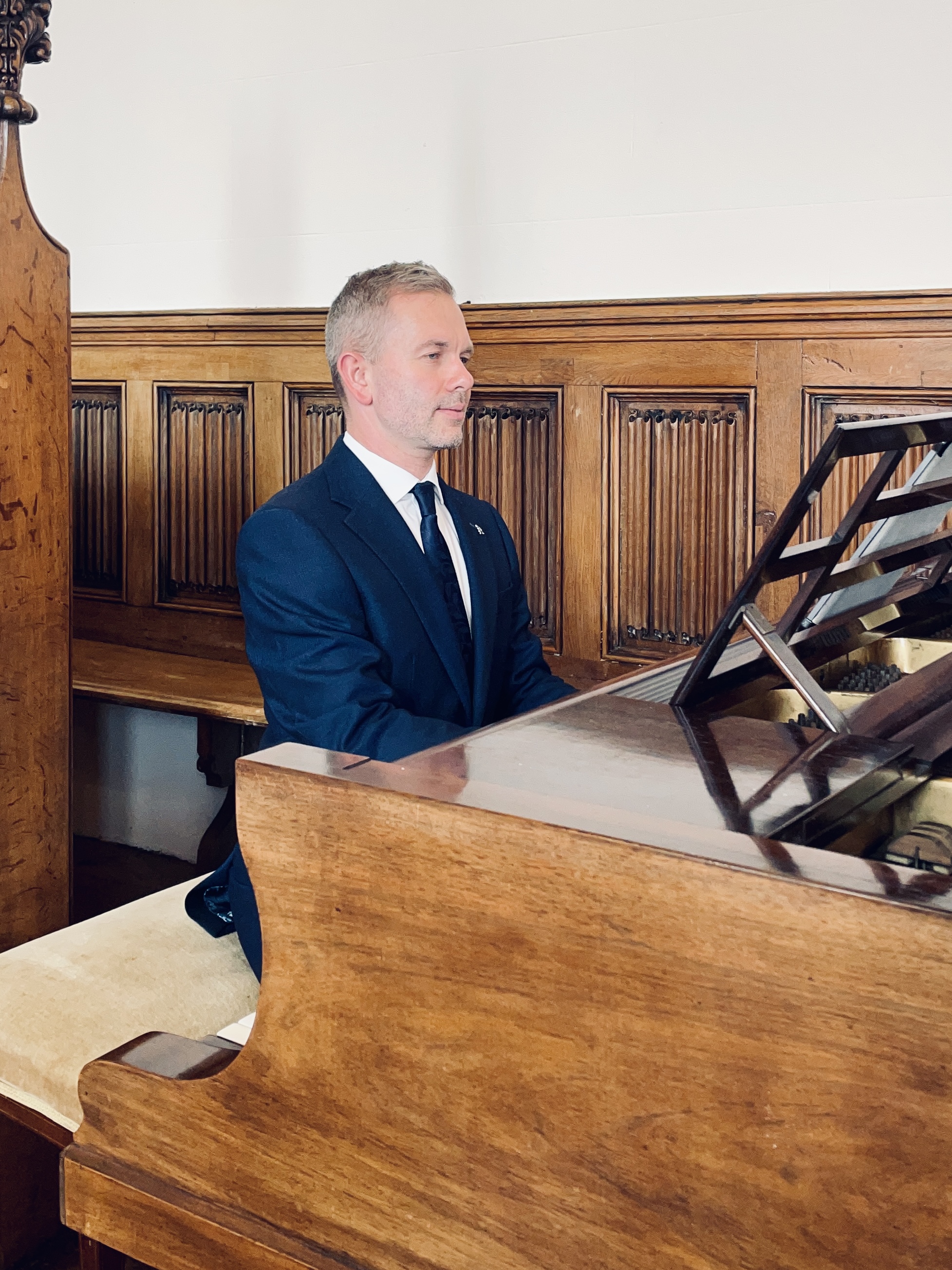 The Lake District Pianist Craig Smith performs during a wedding ceremony in Rose Castle's chapel